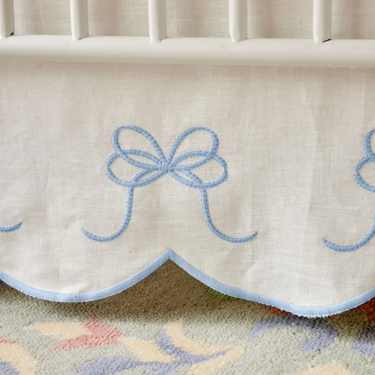 Bow Scalloped Crib Skirt in Soft Blue